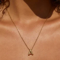 Arms of Eve Statement Letter Necklace GOLD